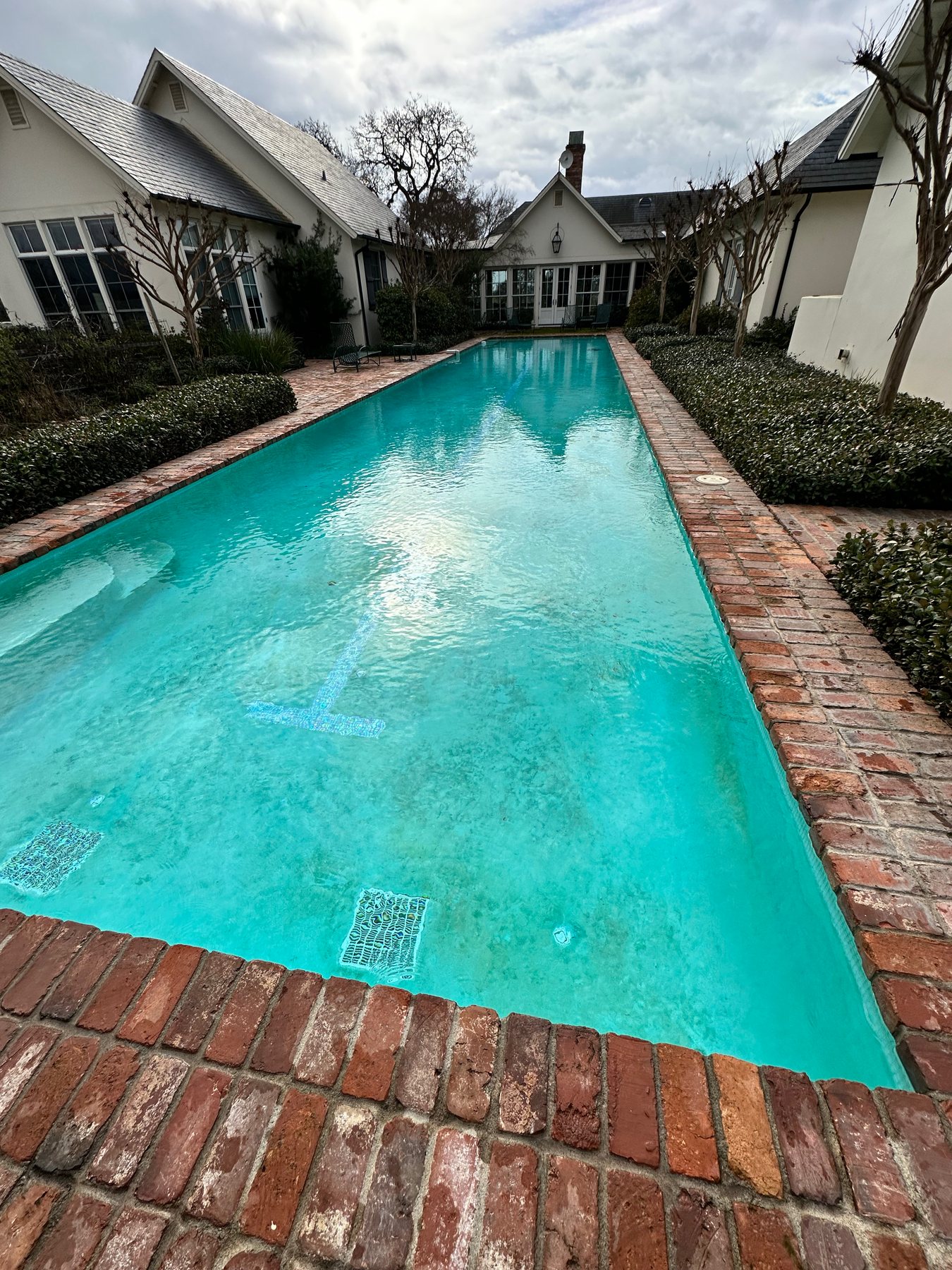 Residential pool with dull or cloudy-looking water awaiting diagnosis