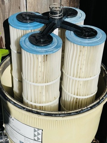 Clean pool filter cartridges after maintenance