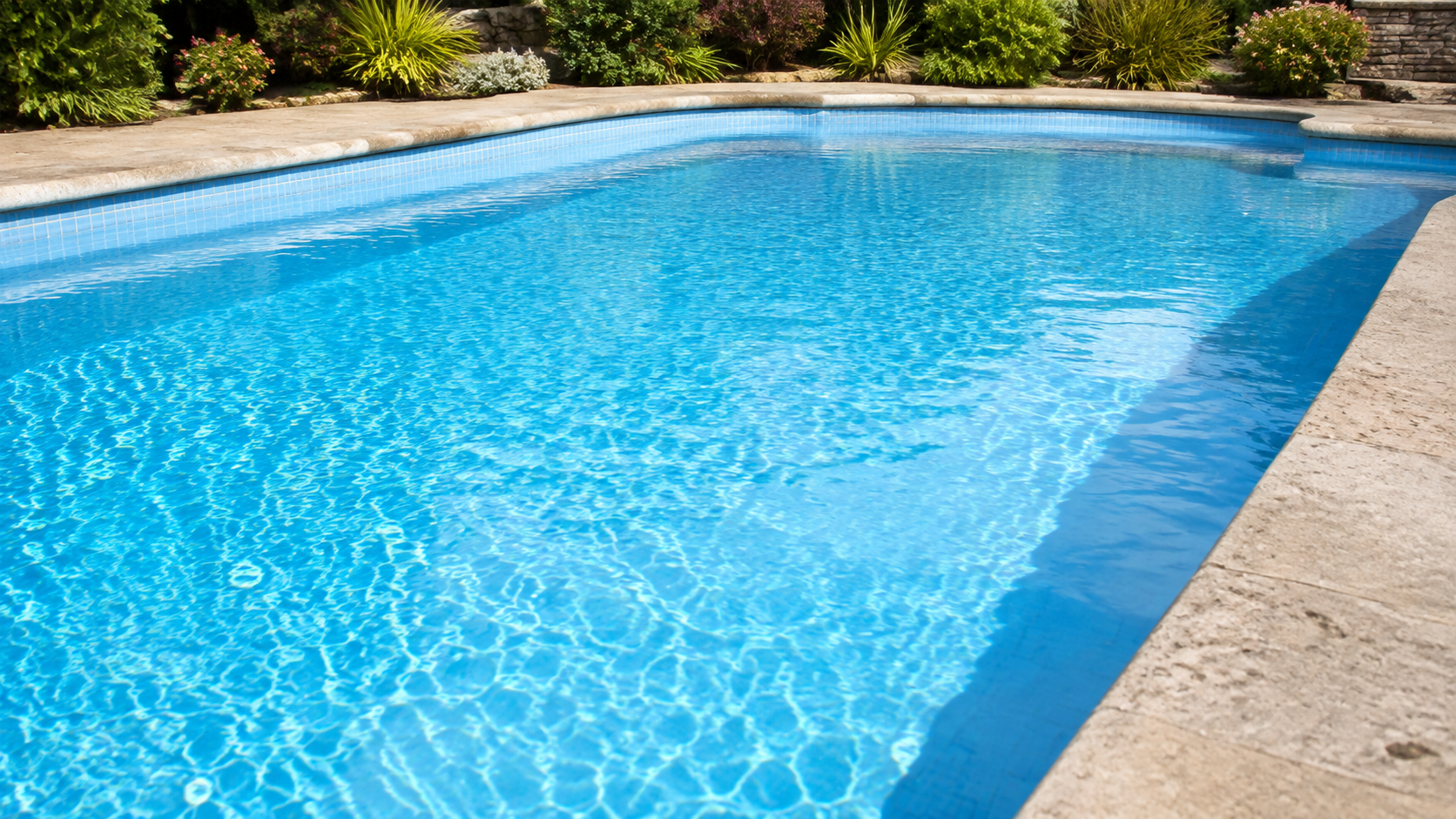 Clear blue residential pool water after accurate testing and balanced pool chemistry